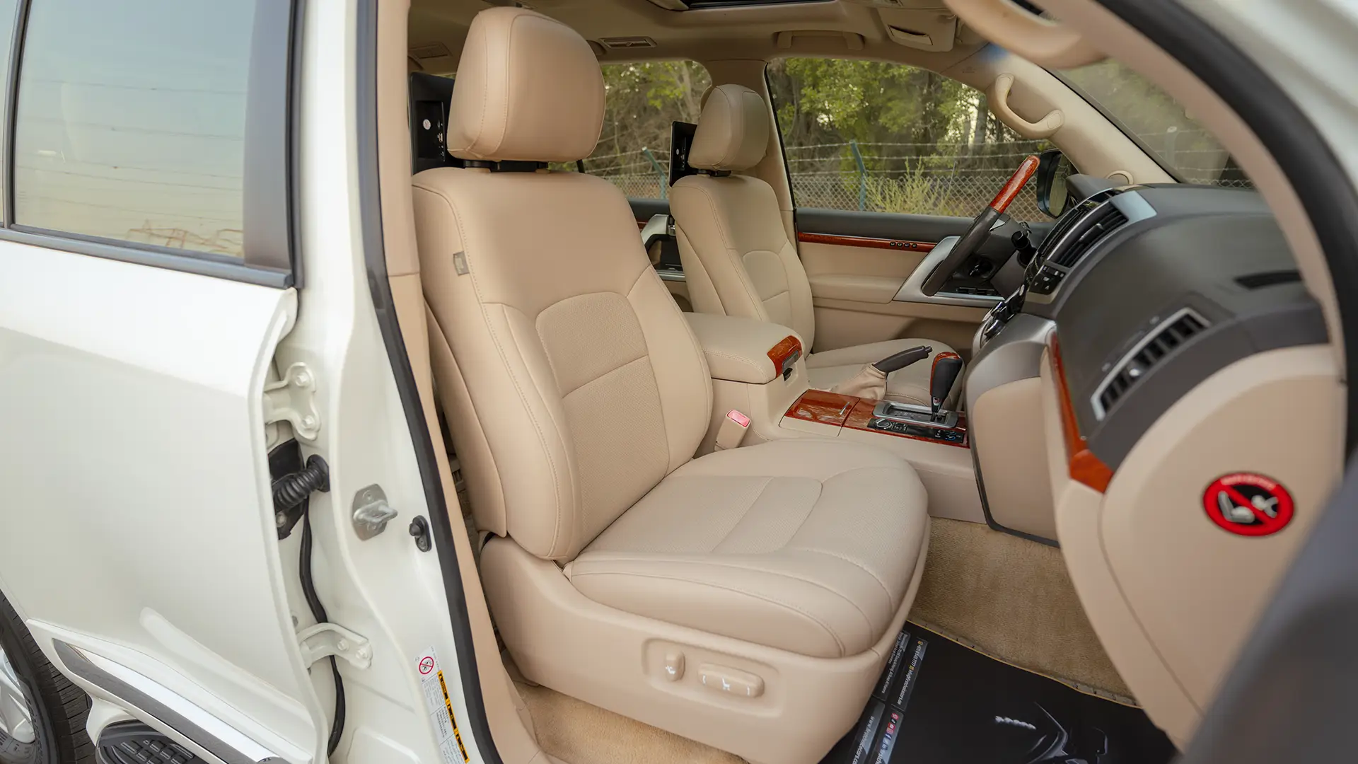 Used 2014 Toyota Land Cruiser VXR in White – Front Passenger Side Cabin View for Sale at First Choice Cars Dubai Sharjah
