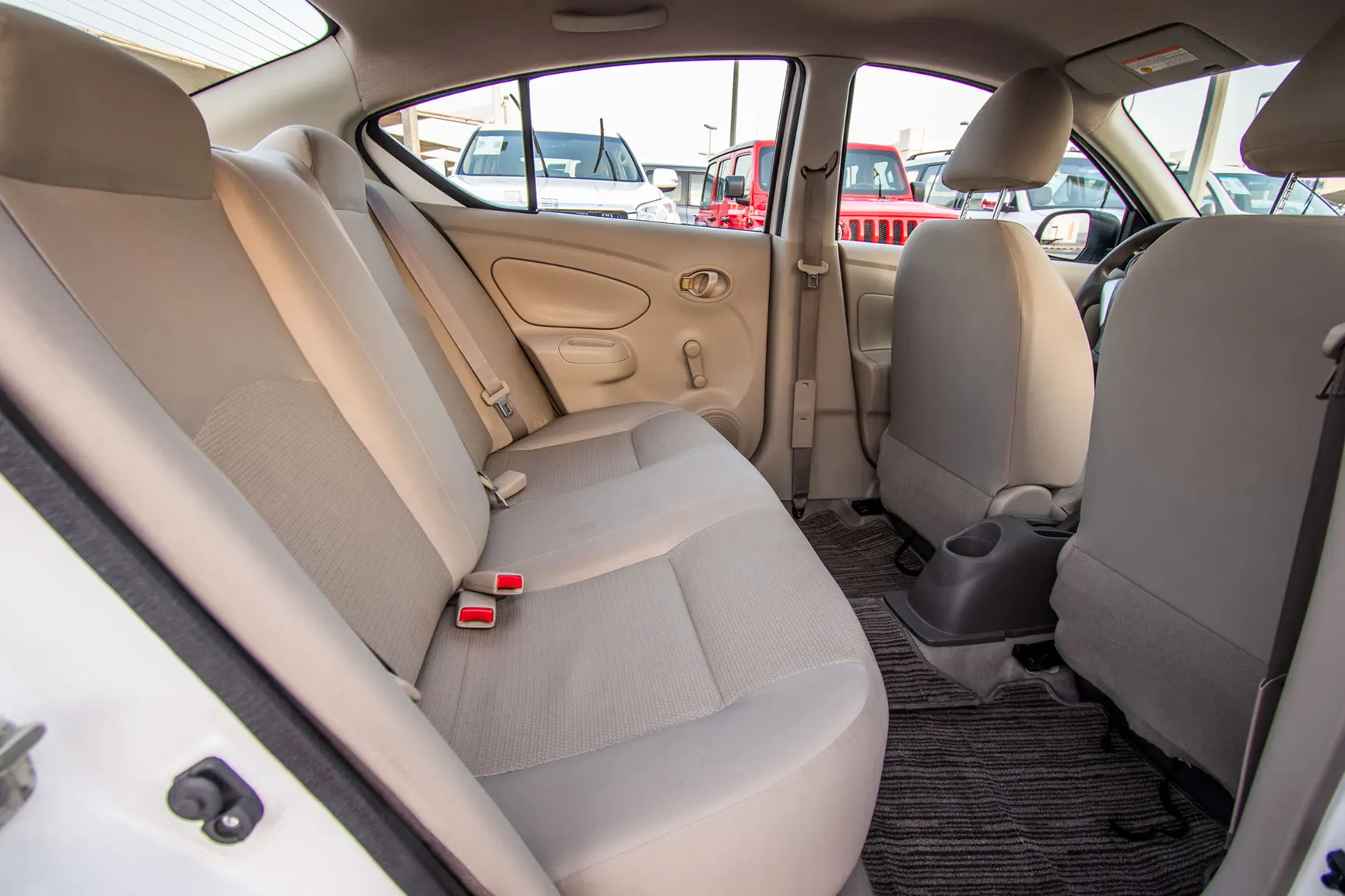 Used 2018 Nissan Sunny S White – Rear Passenger Side Cabin View at First Choice Cars Sharjah