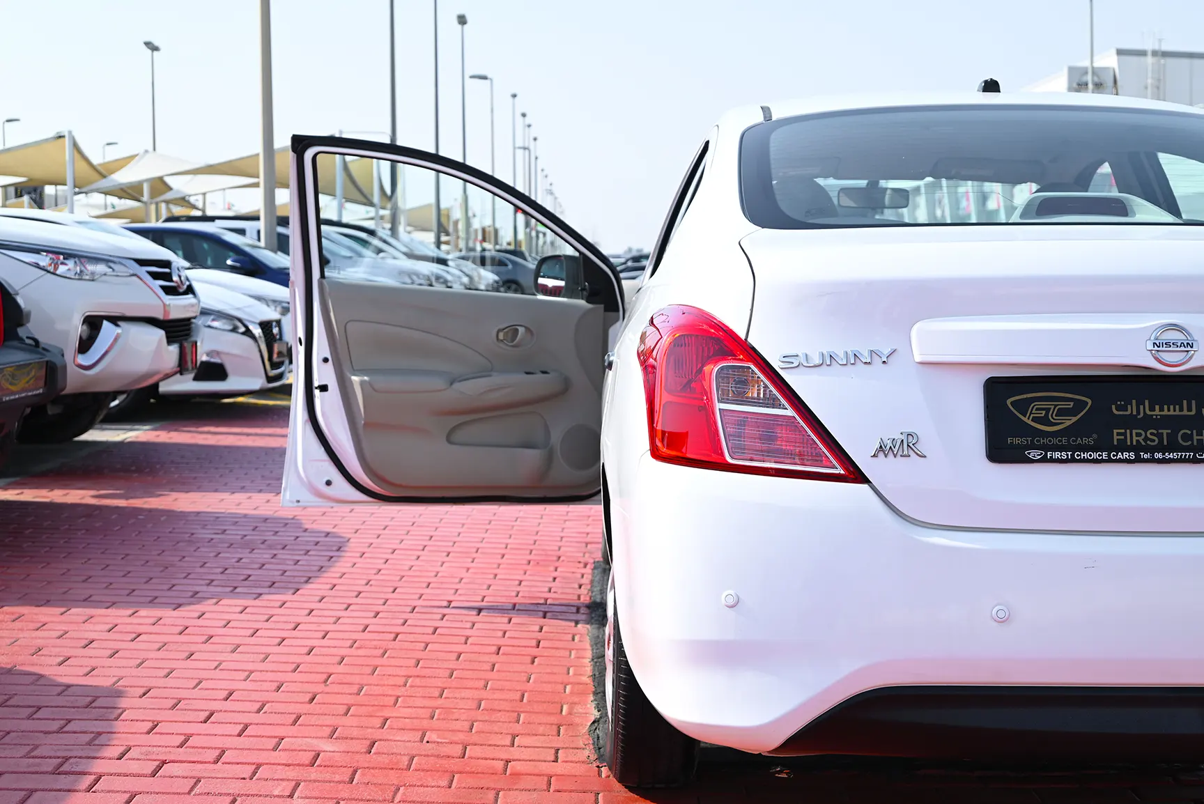 Used 2018 Nissan Sunny S White – Taillight Close-up at First Choice Cars Sharjah