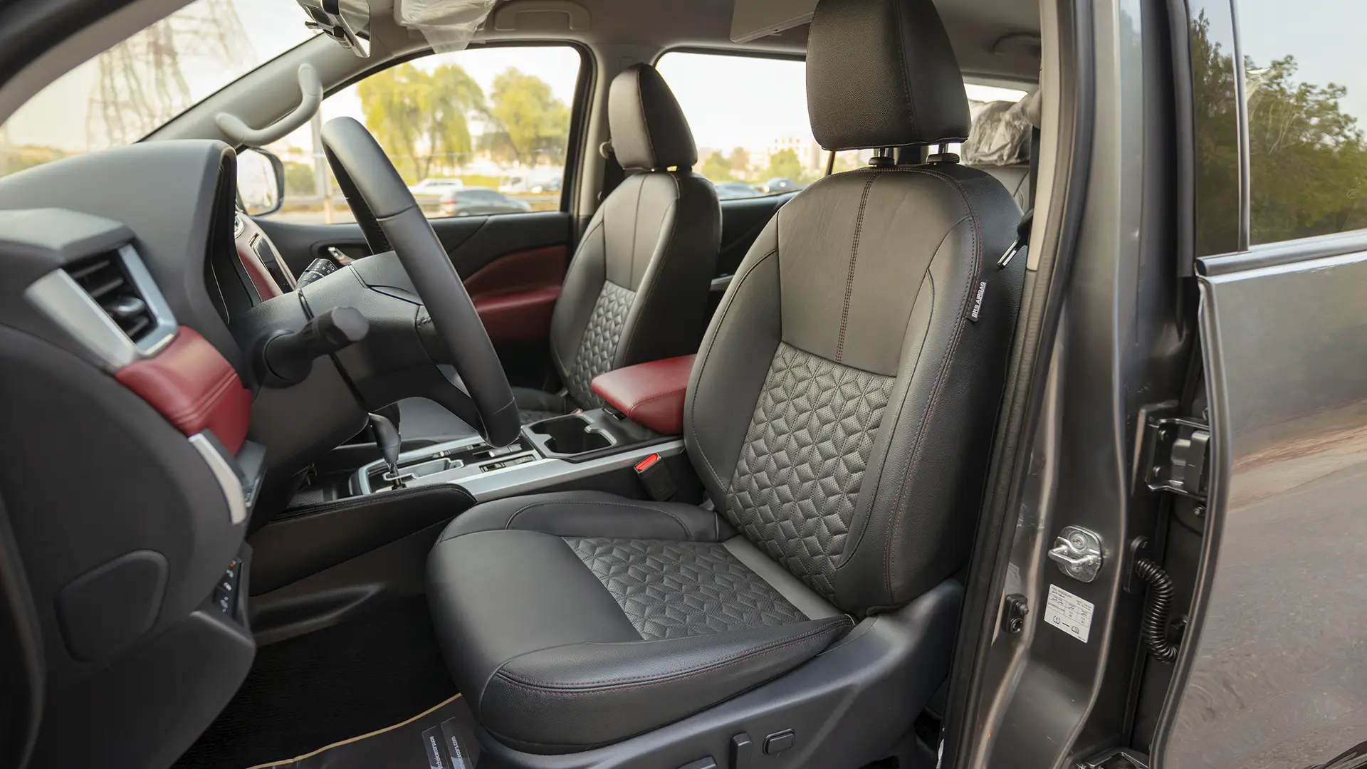 Used 2023 Nissan Xterra Platinum in Grey – Front Driver Side Cabin View for Sale at First Choice Cars Dubai Sharjah