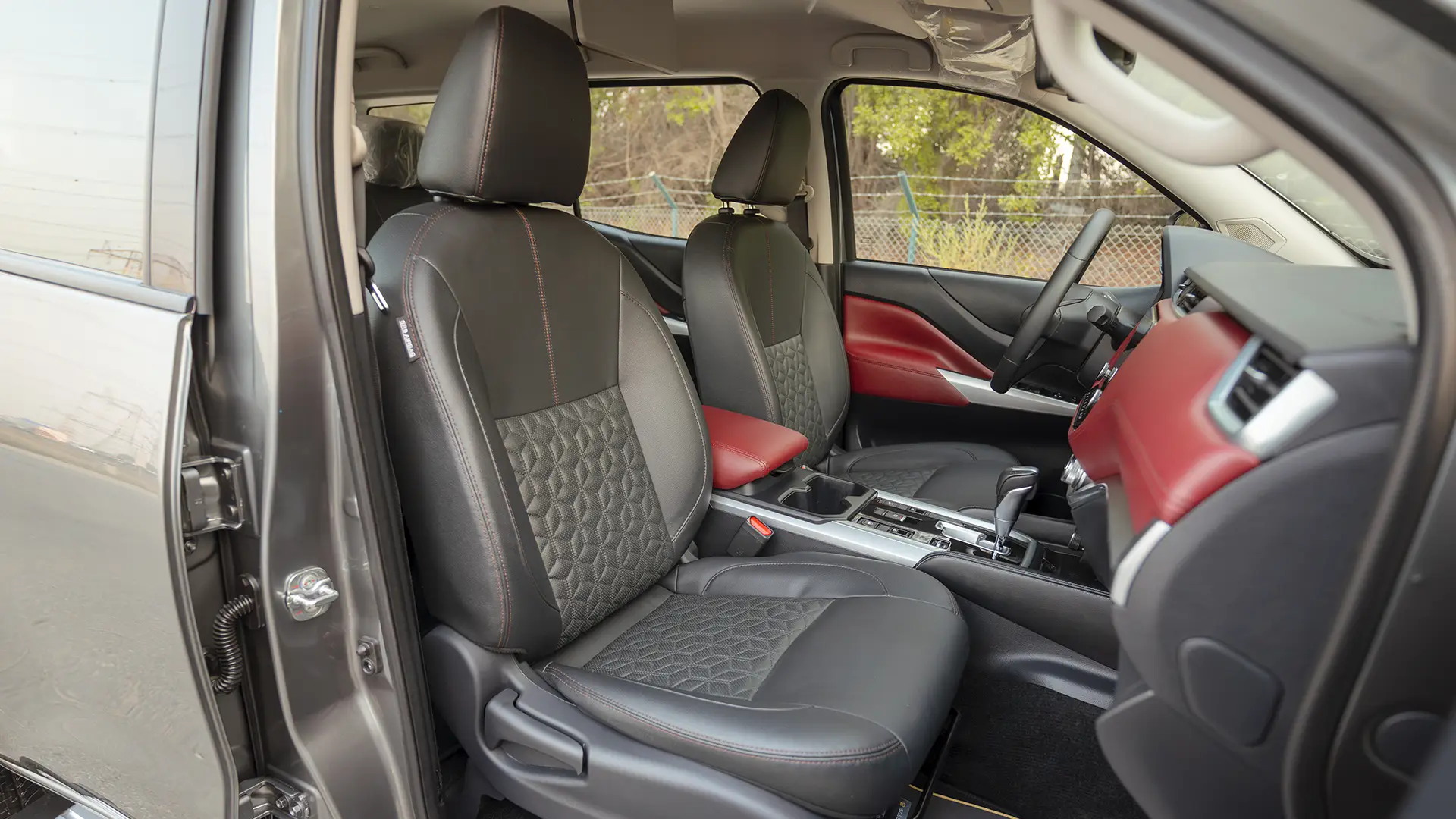 Used 2023 Nissan Xterra Platinum in Grey – Front Passenger Side Cabin View for Sale at First Choice Cars Dubai Sharjah