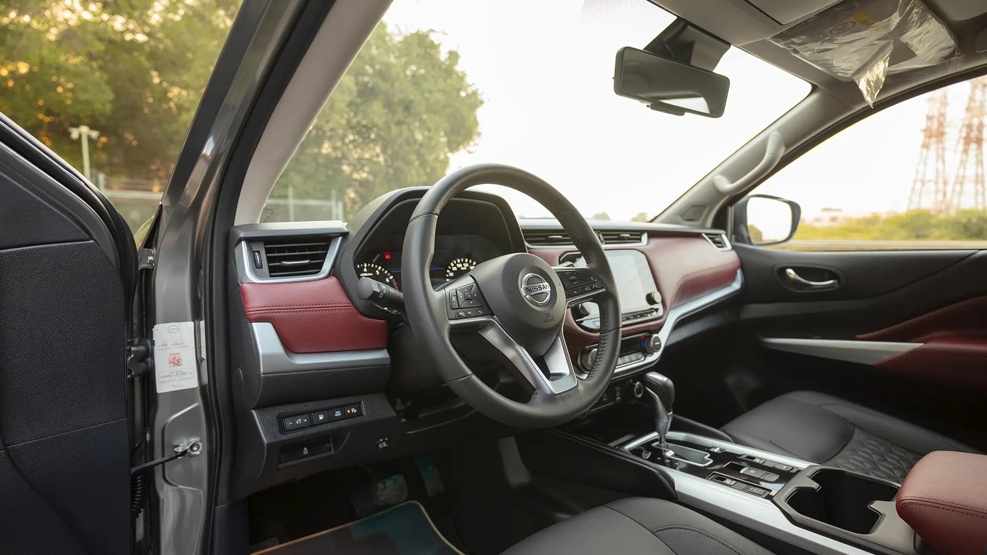 Used 2023 Nissan Xterra Platinum in Grey – Driver Side Dashboard & Steering View for Sale at First Choice Cars Dubai Sharjah
