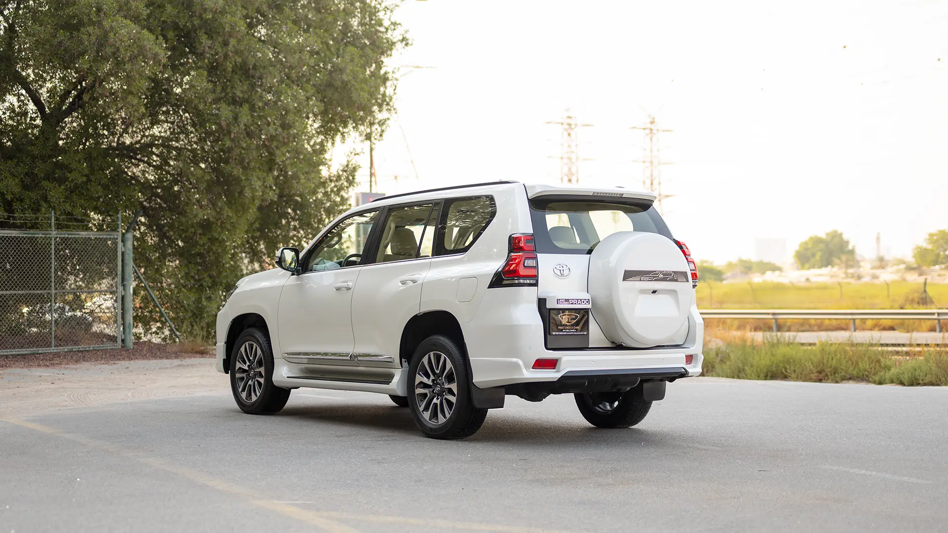 Used 2023 Toyota Prado VXR in White – Left Back Diagonal (45°) View for Sale at First Choice Cars Dubai Sharjah
