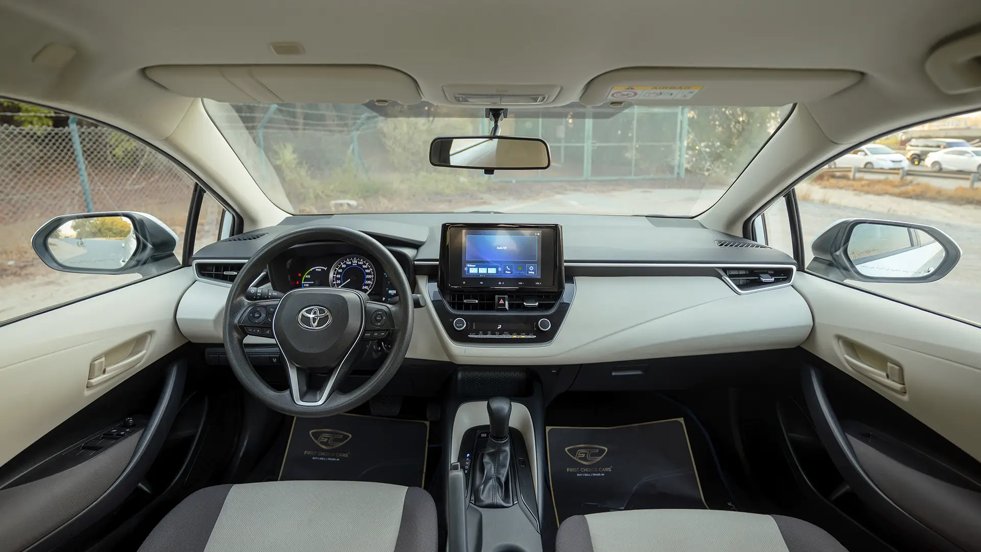 Used 2024 Toyota Corolla XLI in White – Front Cabin / Dashboard Full View for Sale at First Choice Cars Dubai Sharjah
