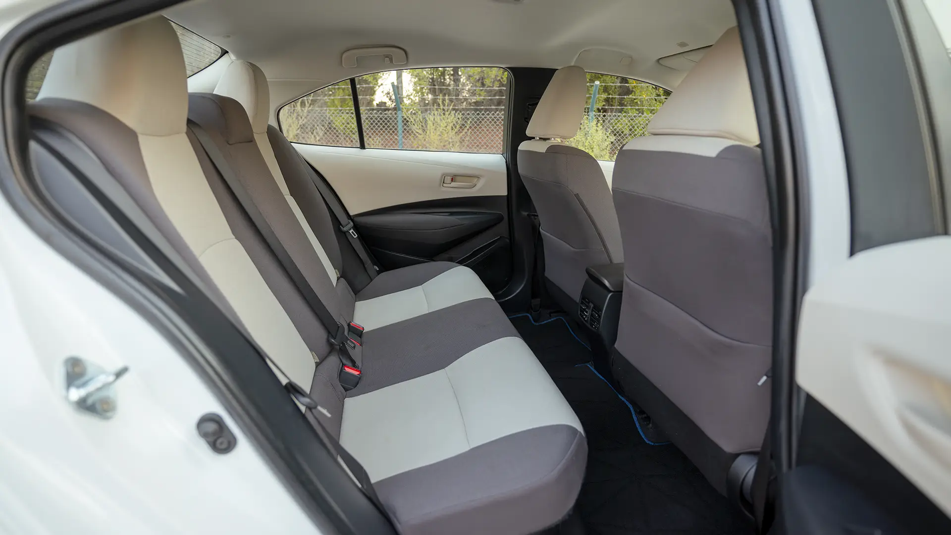 Used 2024 Toyota Corolla XLI in White – Rear Passenger Side Cabin View for Sale at First Choice Cars Dubai Sharjah