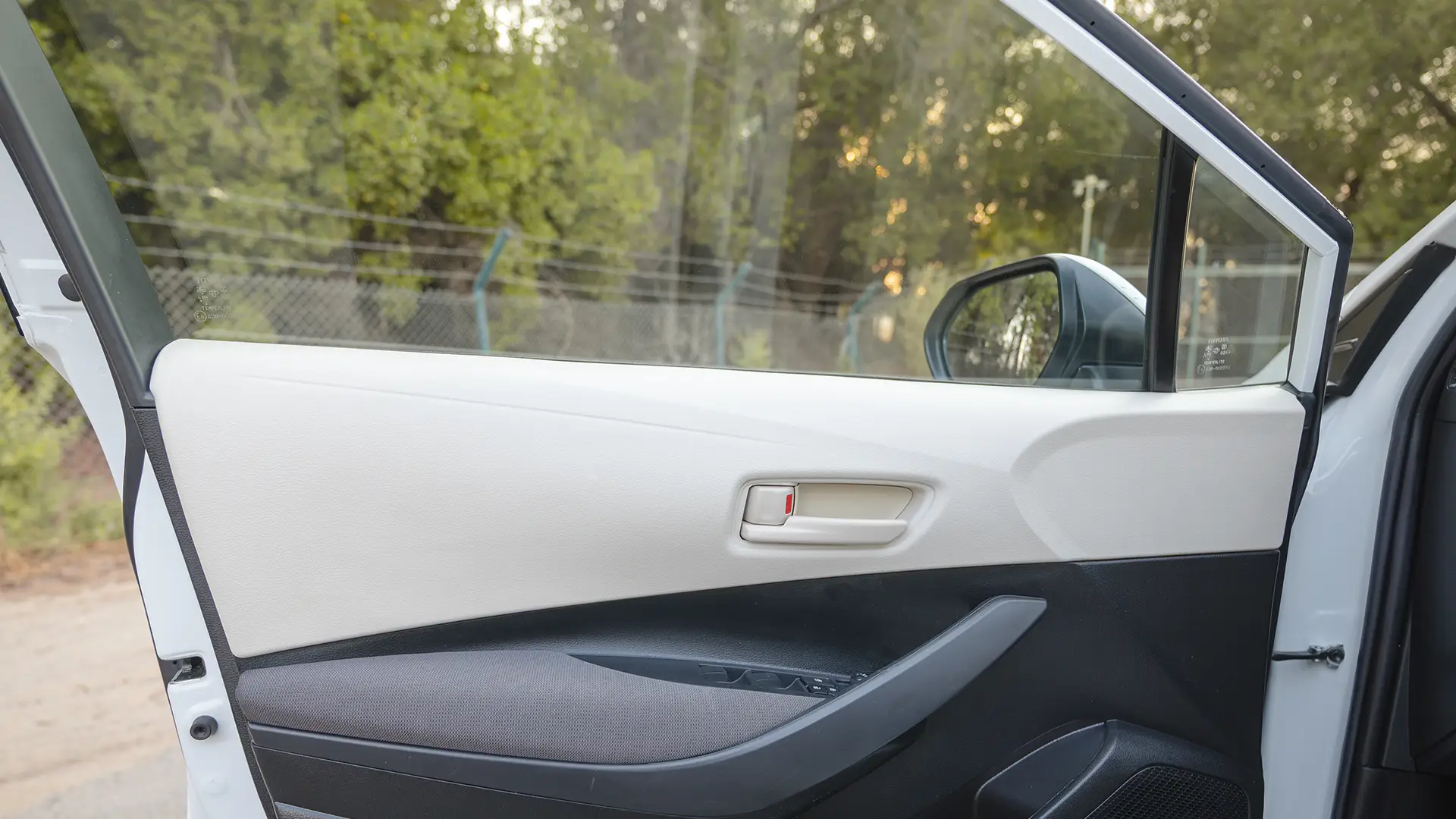 Used 2024 Toyota Corolla XLI in White – Driver Door Panel Full View for Sale at First Choice Cars Dubai Sharjah