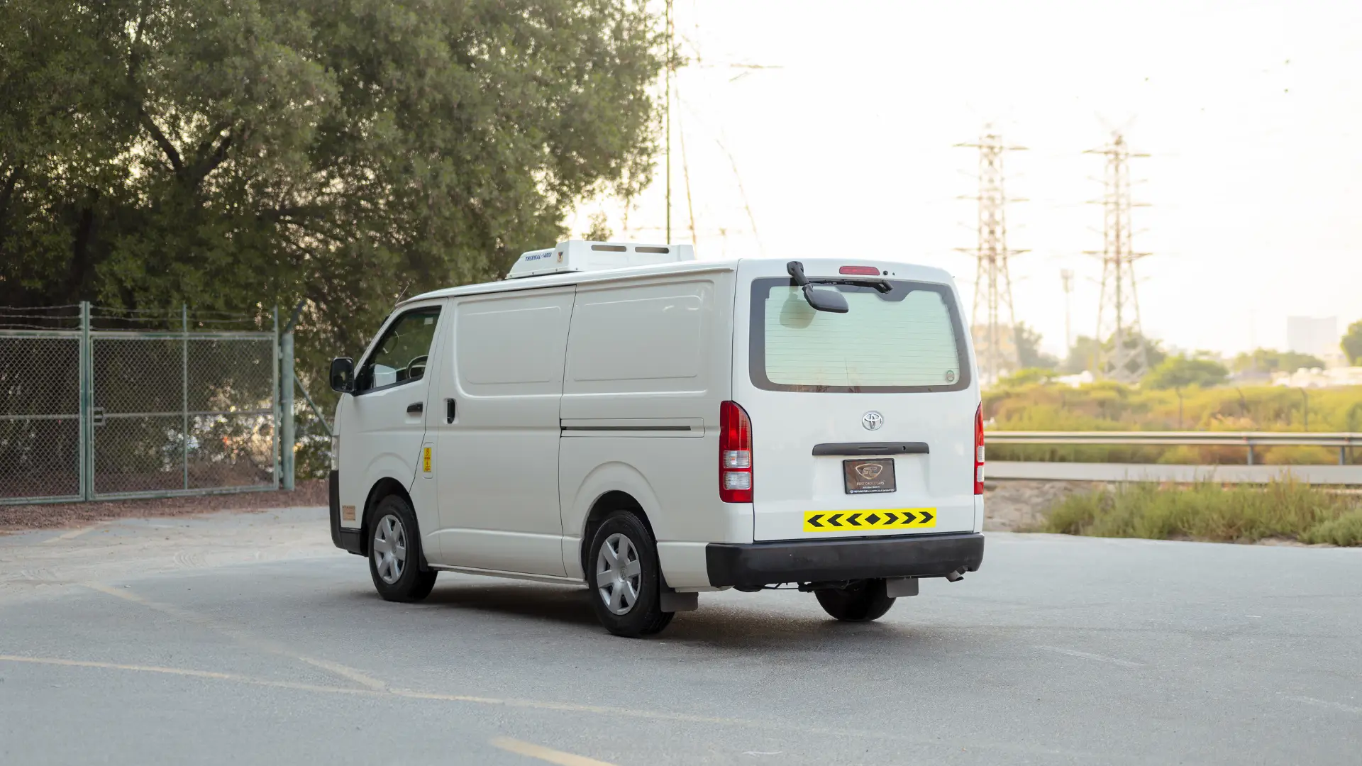 Used 2022 Toyota Hiace GL Standard Roof in White – Left Back Diagonal (45°) View for Sale at First Choice Cars Dubai Sharjah