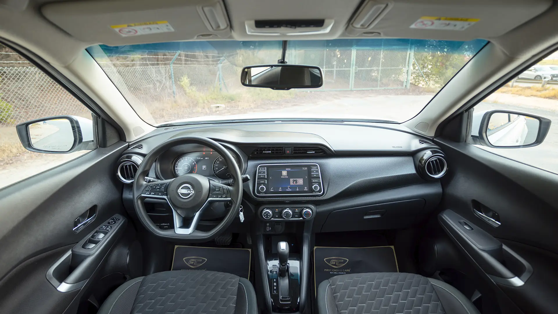 Used 2024 Nissan Kicks SV in White – Front Cabin / Dashboard Full View for Sale at First Choice Cars Dubai Sharjah