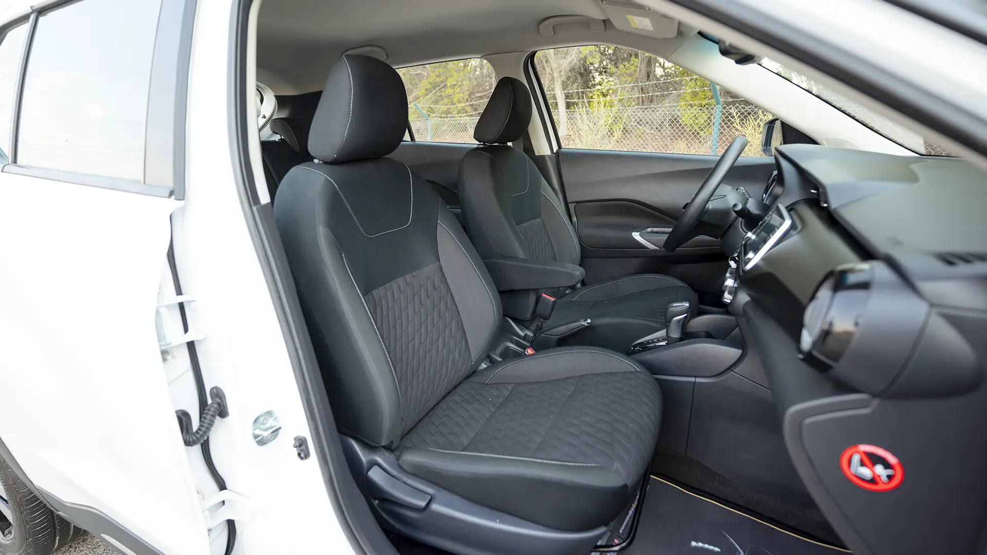 Used 2024 Nissan Kicks SV in White – Front Passenger Side Cabin View for Sale at First Choice Cars Dubai Sharjah