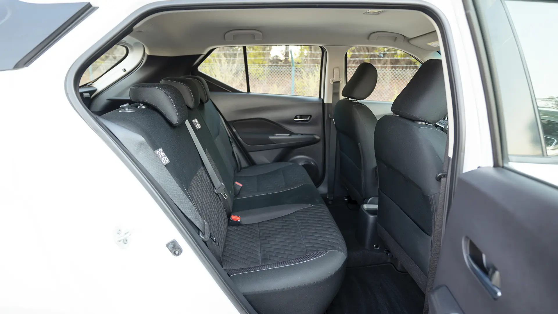 Used 2024 Nissan Kicks SV in White – Rear Passenger Side Cabin View for Sale at First Choice Cars Dubai Sharjah