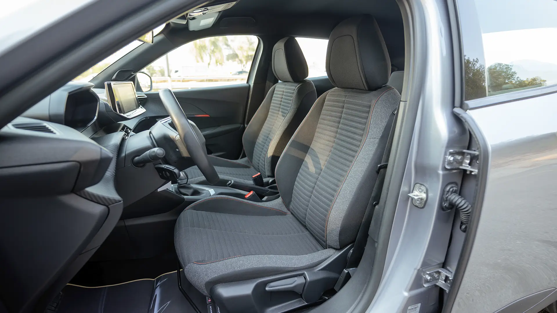 Used 2023 Peugeot 2008 Allure in Silver – Front Driver Side Cabin View for Sale at First Choice Cars Dubai Sharjah
