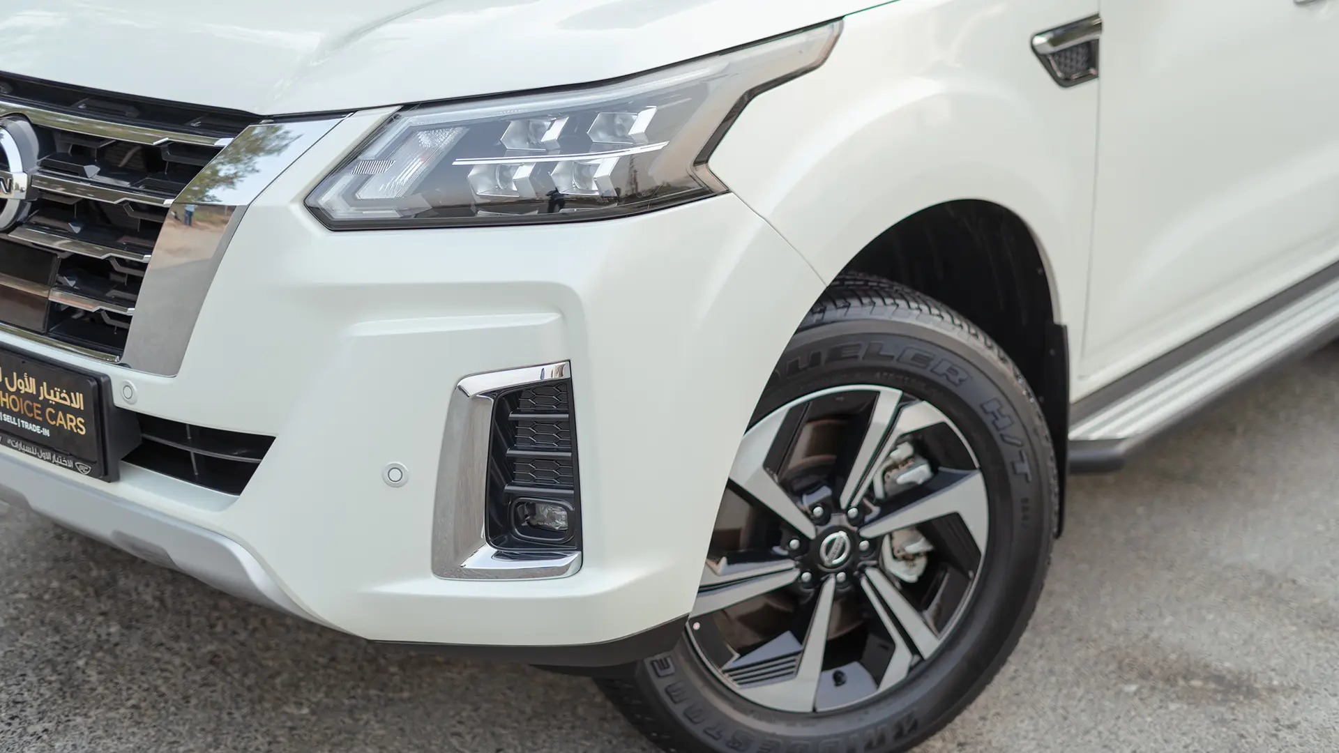 Used 2024 Nissan Xterra Platinum in White – Headlight Close-up for Sale at First Choice Cars Dubai Sharjah