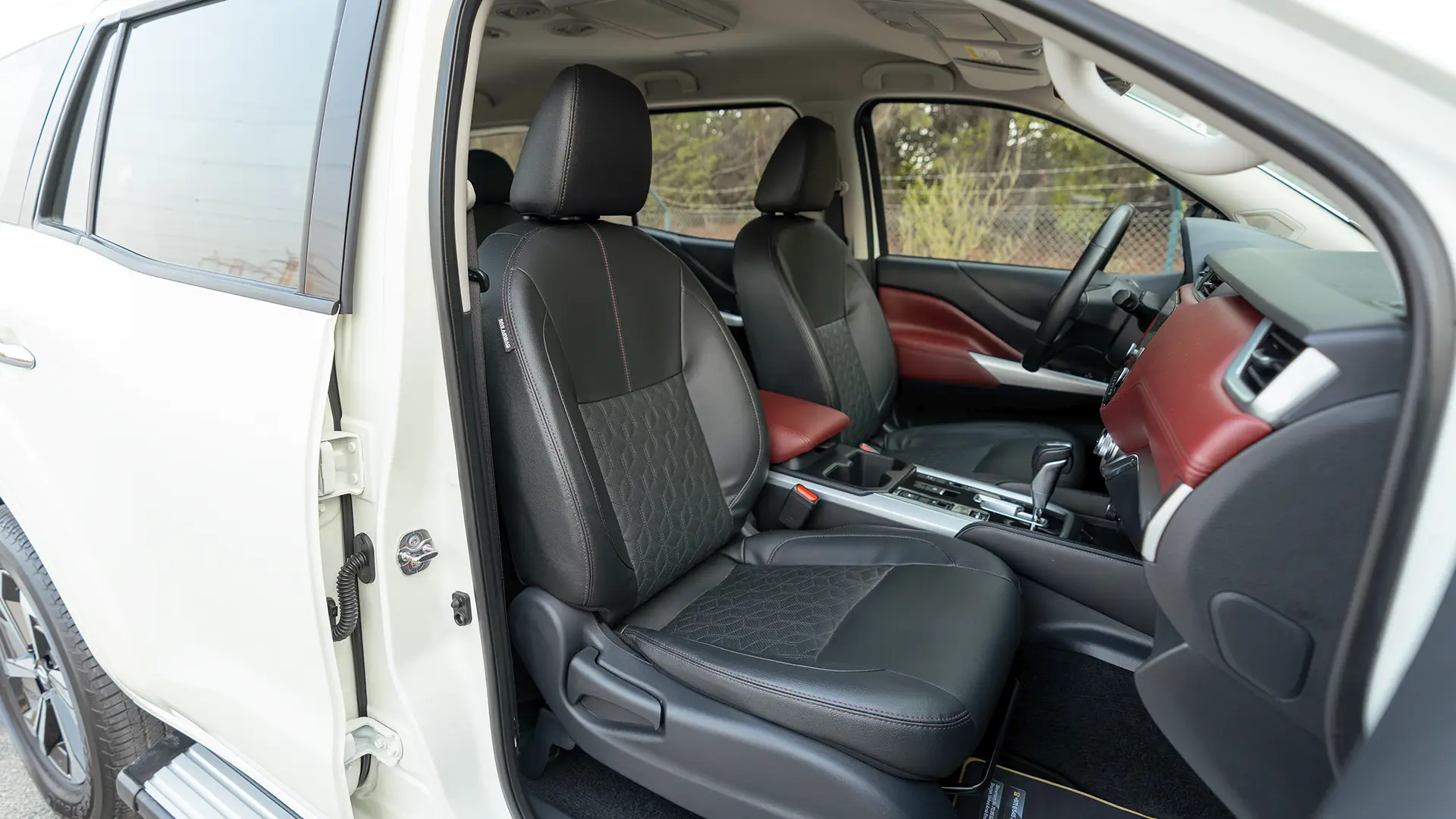 Used 2024 Nissan Xterra Platinum in White – Front Passenger Side Cabin View for Sale at First Choice Cars Dubai Sharjah