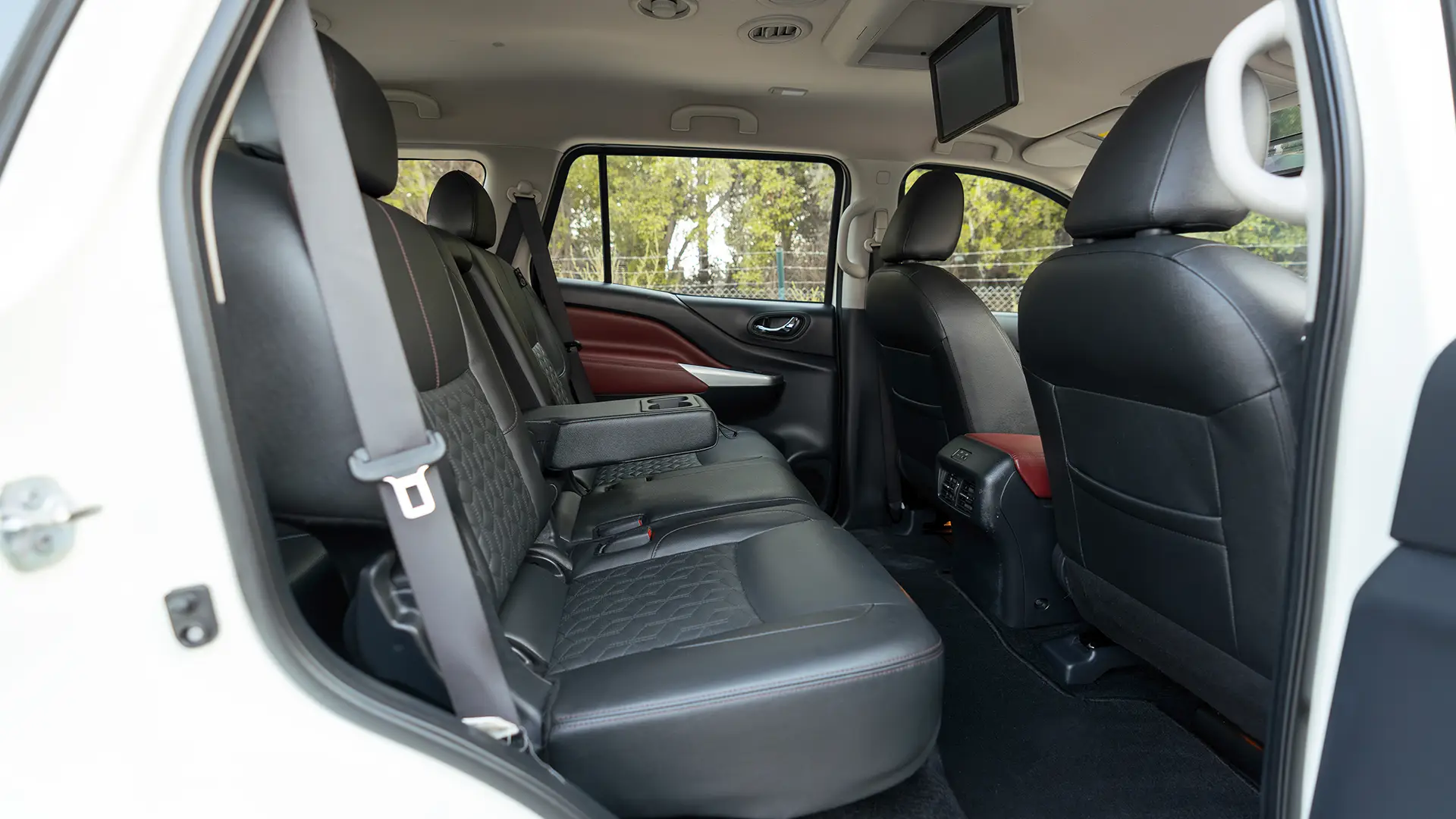 Used 2024 Nissan Xterra Platinum in White – Rear Passenger Side Cabin View for Sale at First Choice Cars Dubai Sharjah