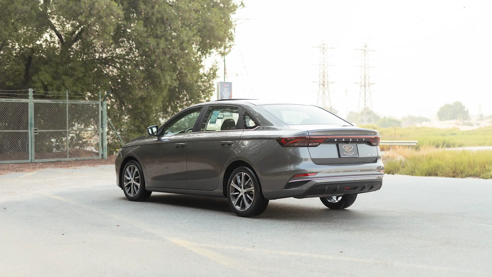 Used 2025 Geely Emgrand GF in Grey – Left Back Diagonal (45°) View for Sale at First Choice Cars Dubai Sharjah