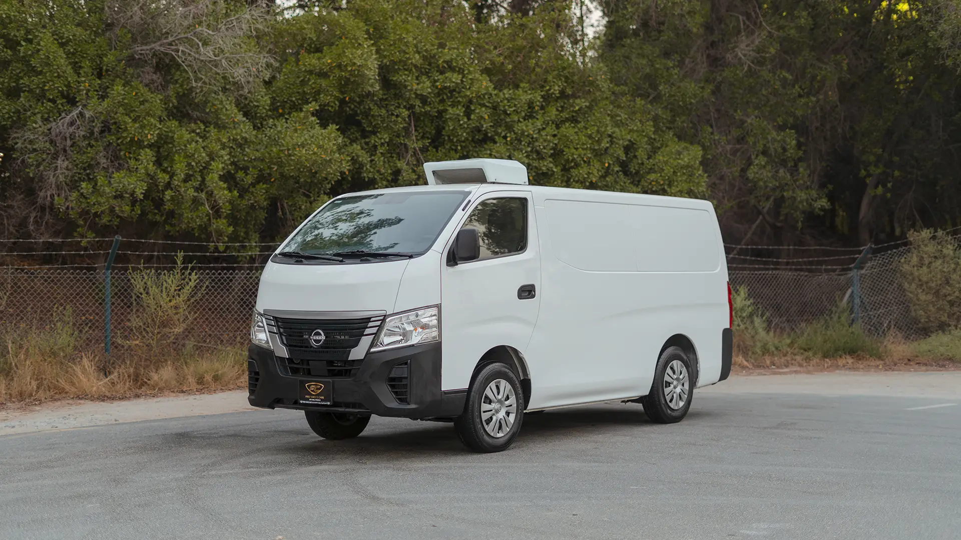 Used 2023 Nissan Urvan Standard Roof in White – Left Front Diagonal (45°) View for Sale at First Choice Cars Dubai Sharjah