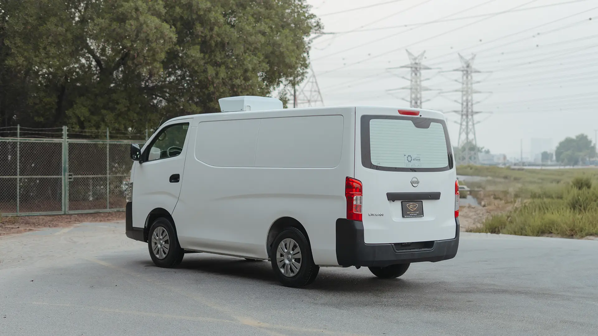 Used 2023 Nissan Urvan Standard Roof in White – Left Back Diagonal (45°) View for Sale at First Choice Cars Dubai Sharjah