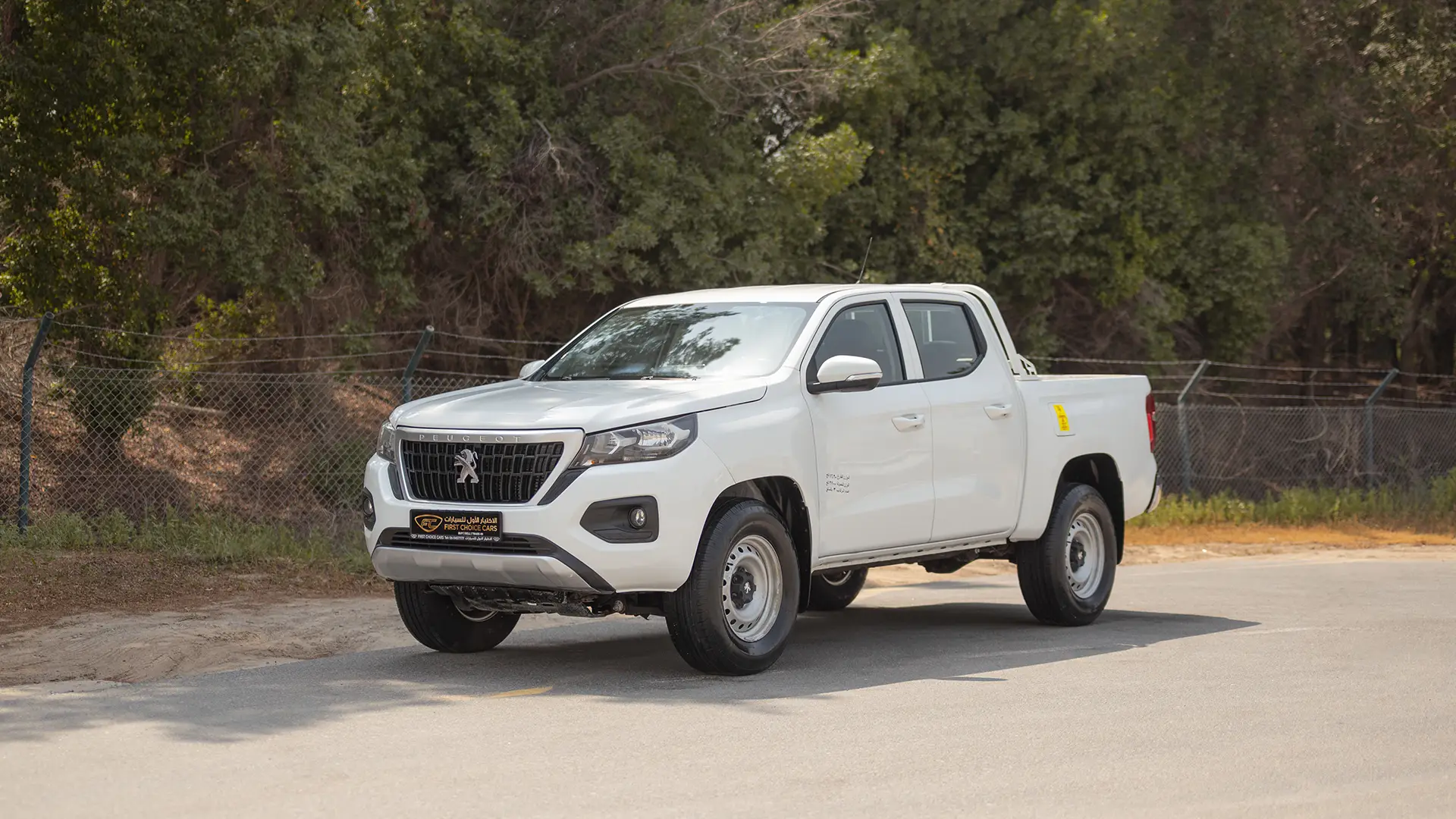 Used 2023 Peugeot Landtrek Double Cabin in White – Left Front Diagonal (45°) View for Sale at First Choice Cars Dubai Sharjah