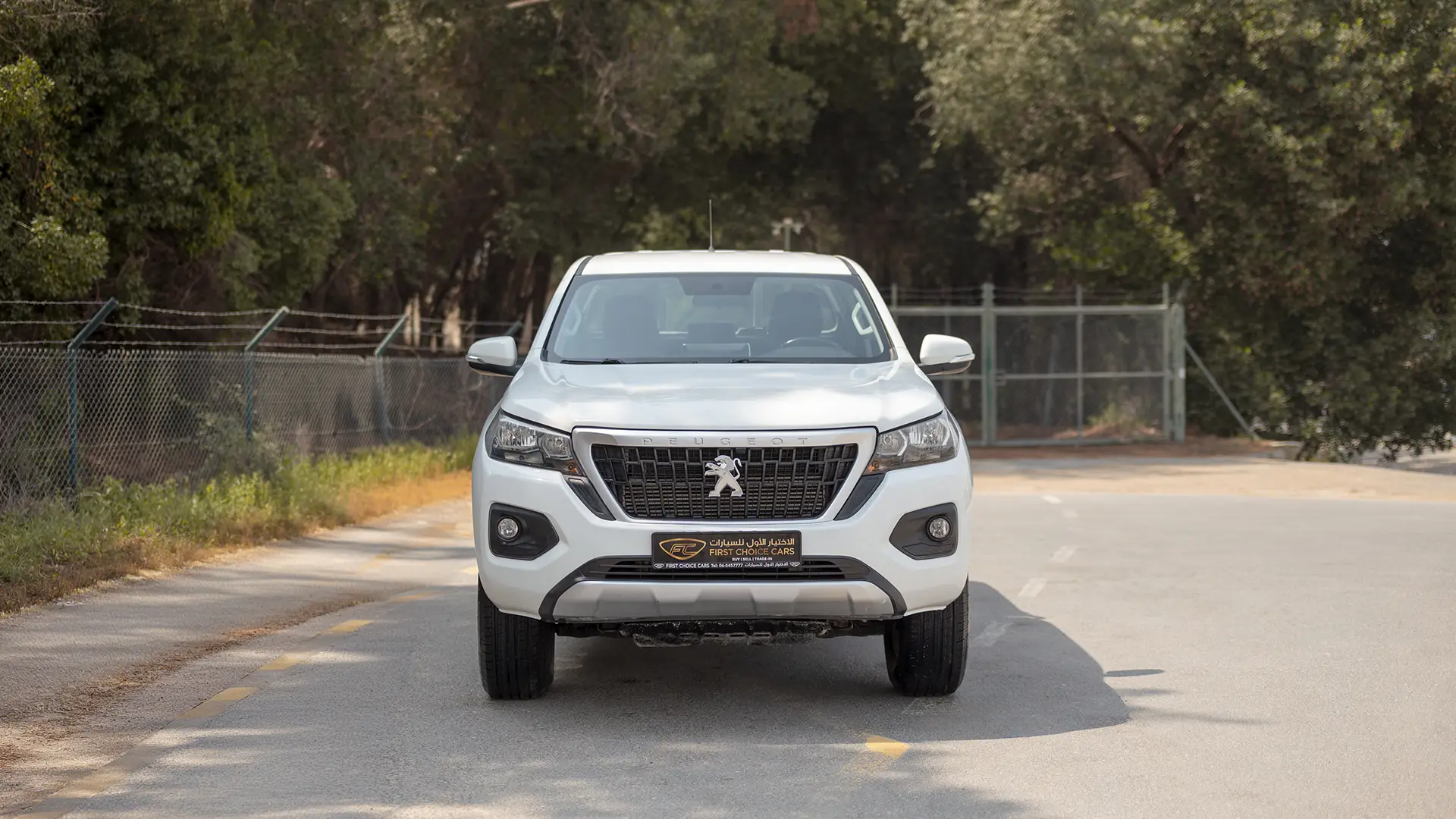 Used 2023 Peugeot Landtrek Double Cabin in White – Front View for Sale at First Choice Cars Dubai Sharjah