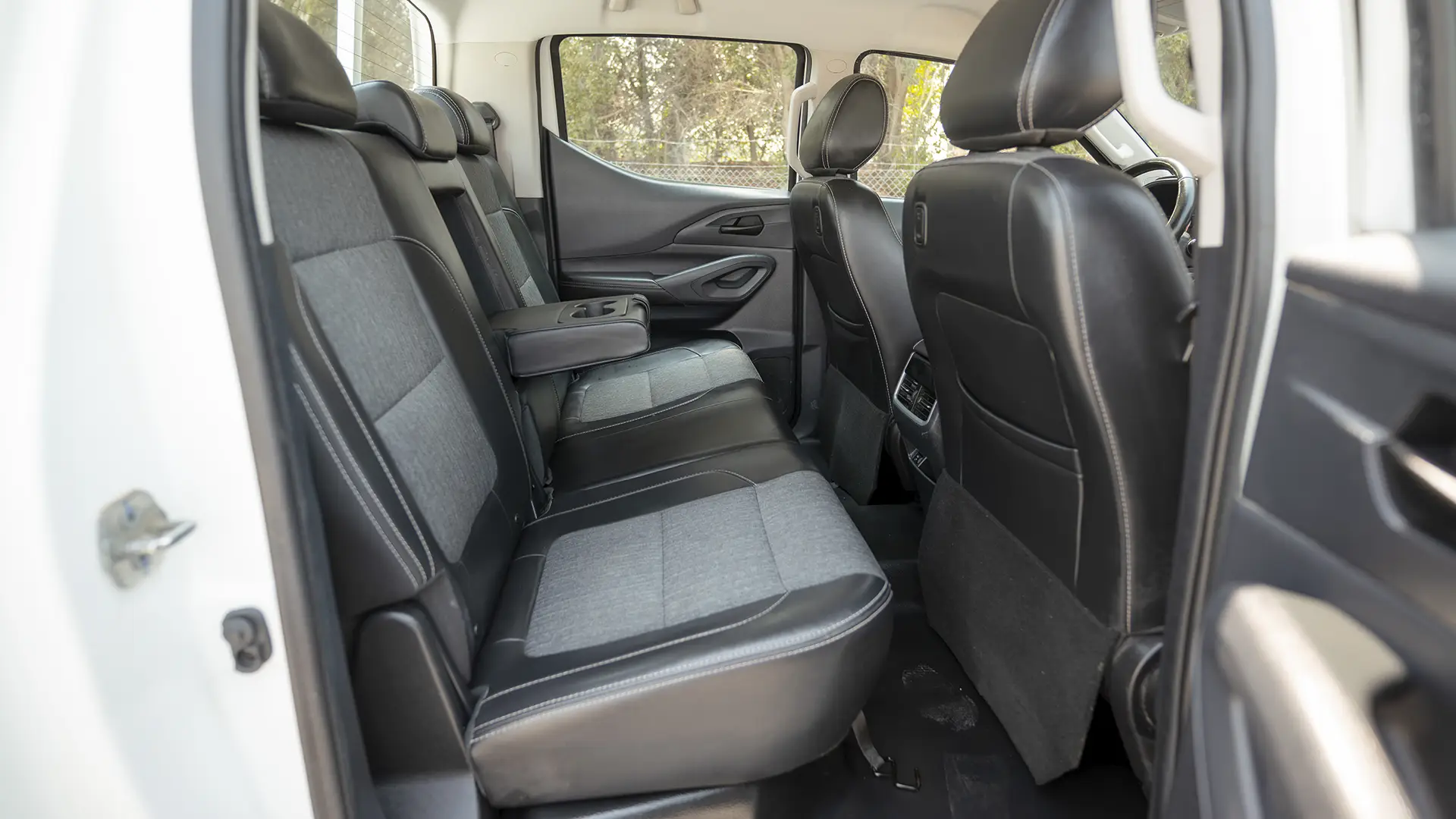 Used 2023 Peugeot Landtrek Double Cabin in White – Rear Passenger Side Cabin View for Sale at First Choice Cars Dubai Sharjah