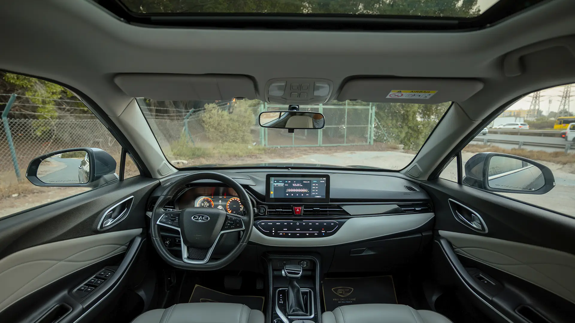 Used 2023 JAC JS4 Intelligent in Grey – Front Cabin / Dashboard Full View for Sale at First Choice Cars Dubai Sharjah