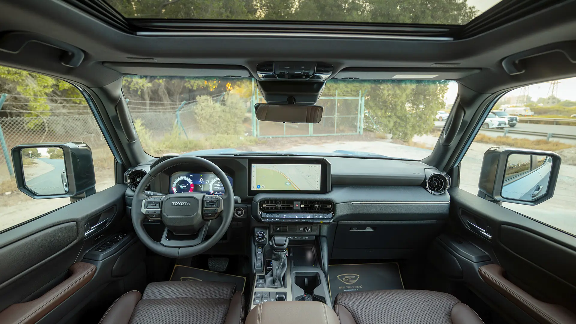Used 2025 Toyota Prado Adventure in Blue – Front Cabin / Dashboard Full View for Sale at First Choice Cars Dubai Sharjah