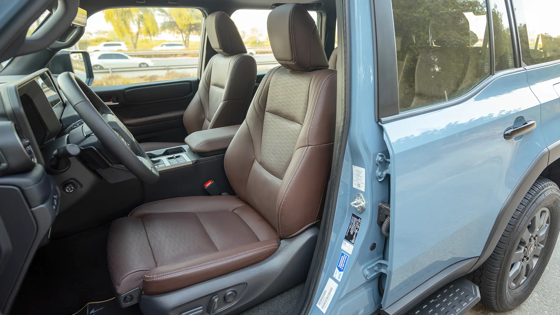 Used 2025 Toyota Prado Adventure in Blue – Front Driver Side Cabin View for Sale at First Choice Cars Dubai Sharjah
