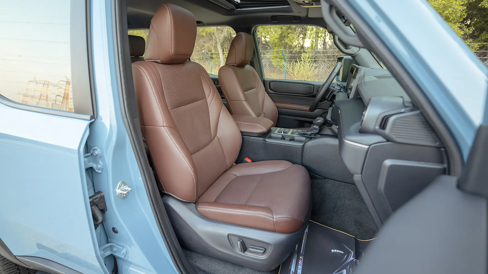 Used 2025 Toyota Prado Adventure in Blue – Front Passenger Side Cabin View for Sale at First Choice Cars Dubai Sharjah