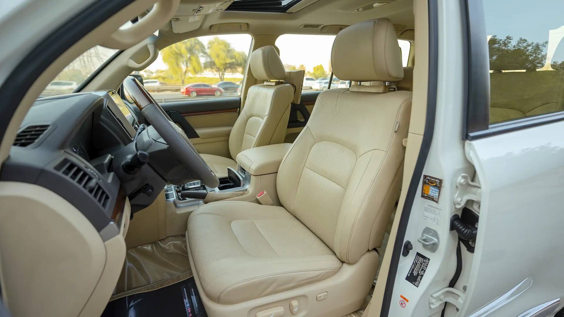 Used 2017 Toyota Land Cruiser GXR in White – Front Driver Side Cabin View for Sale at First Choice Cars Dubai Sharjah