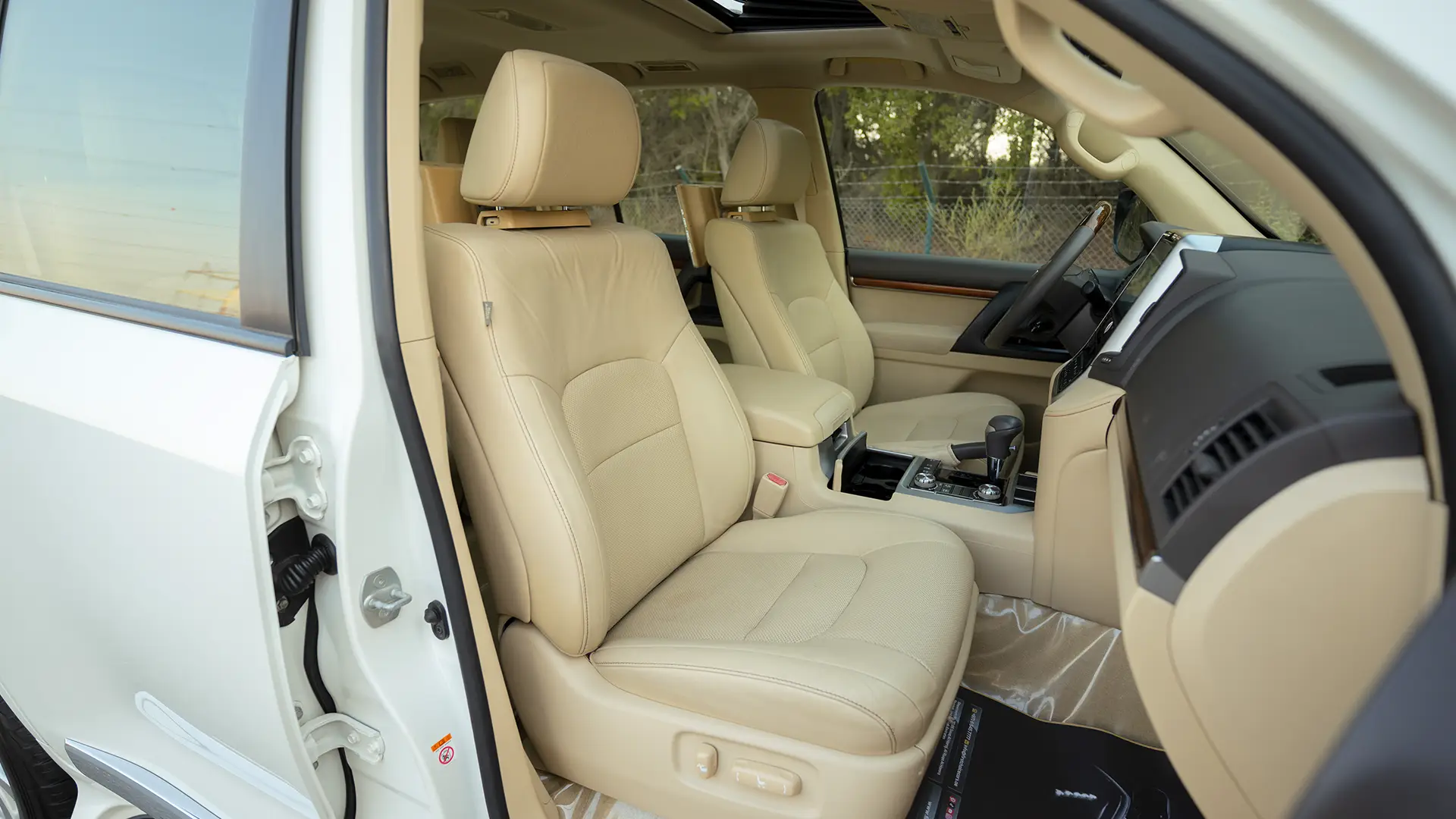Used 2017 Toyota Land Cruiser GXR in White – Front Passenger Side Cabin View for Sale at First Choice Cars Dubai Sharjah