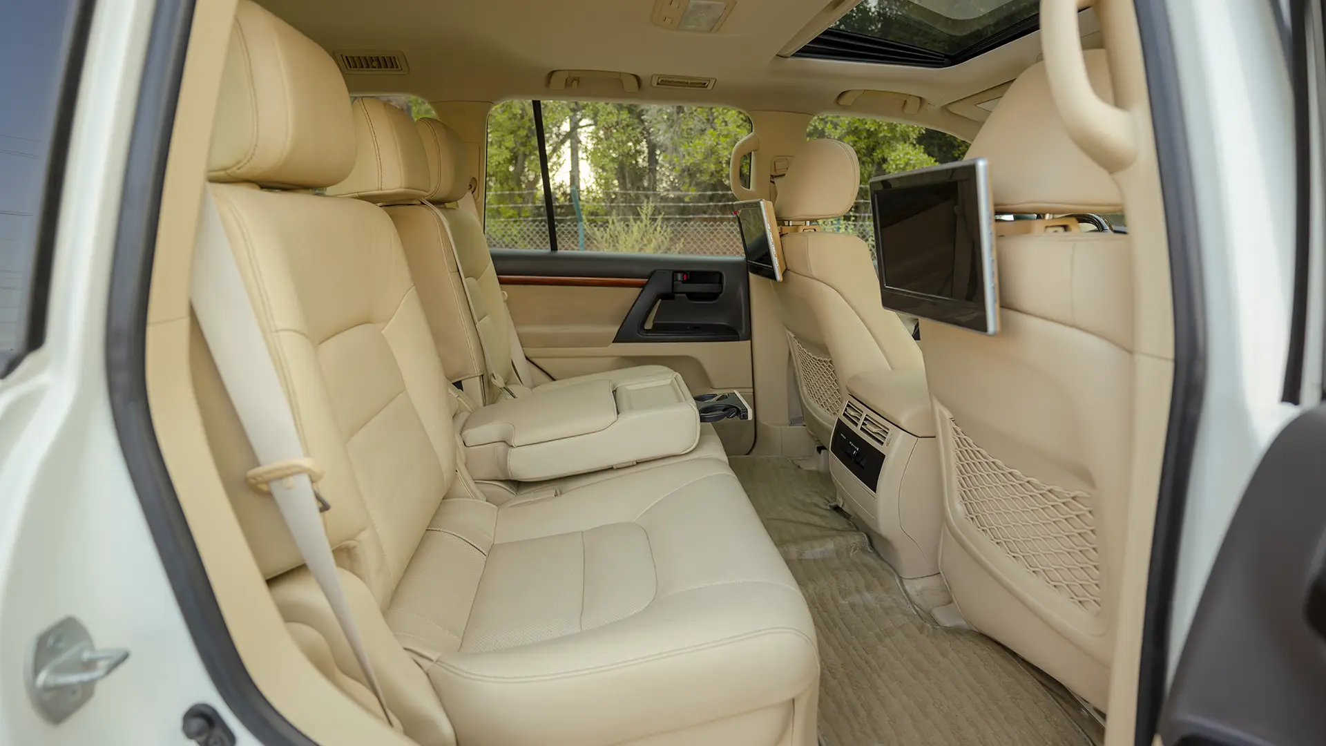 Used 2017 Toyota Land Cruiser GXR in White – Rear Passenger Side Cabin View for Sale at First Choice Cars Dubai Sharjah