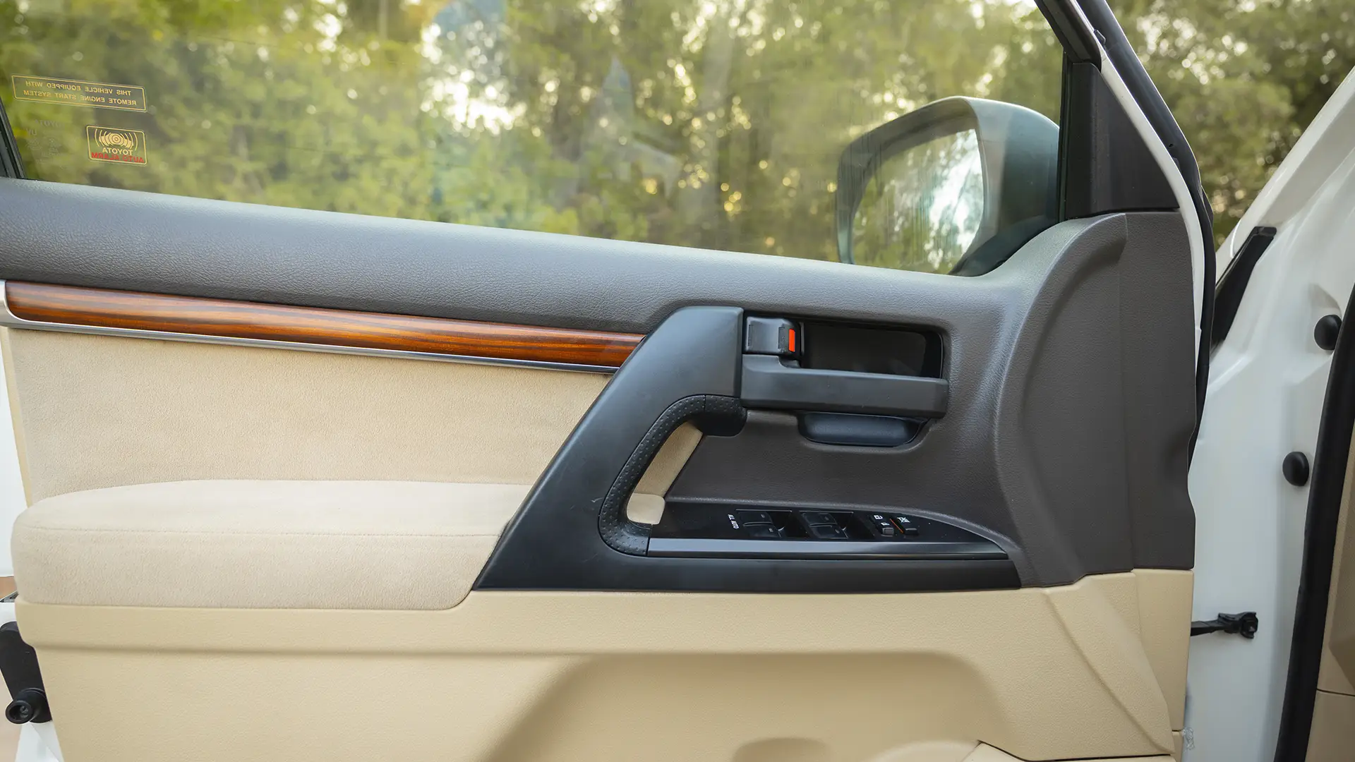Used 2017 Toyota Land Cruiser GXR in White – Driver Door Panel Full View for Sale at First Choice Cars Dubai Sharjah