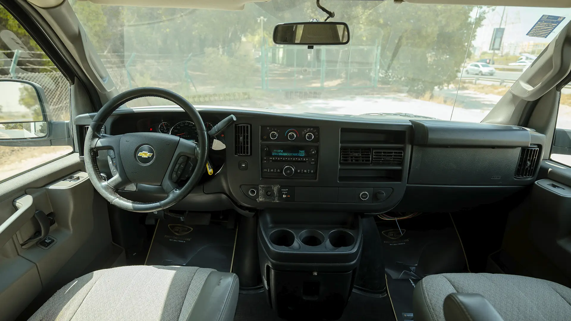 Used 2020 Chevrolet Express LS in White – Front Cabin / Dashboard Full View for Sale at First Choice Cars Dubai Sharjah