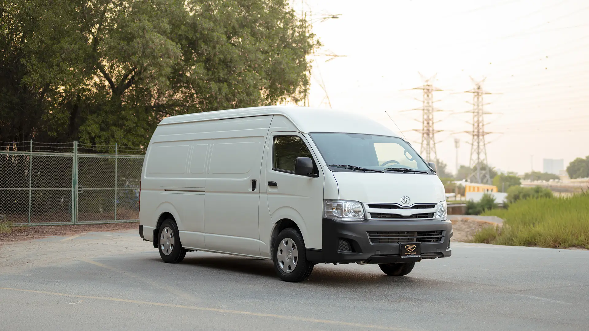 Used 2012 Toyota Hiace GL High Roof in White – Right Front Diagonal (45°) View for Sale at First Choice Cars Dubai Sharjah