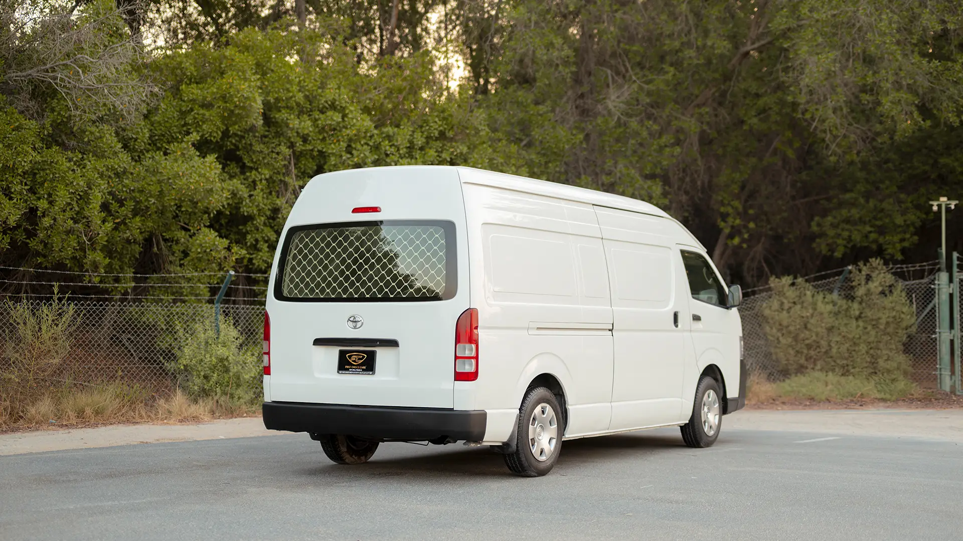 Used 2012 Toyota Hiace GL High Roof in White – Left Back Diagonal (45°) View for Sale at First Choice Cars Dubai Sharjah