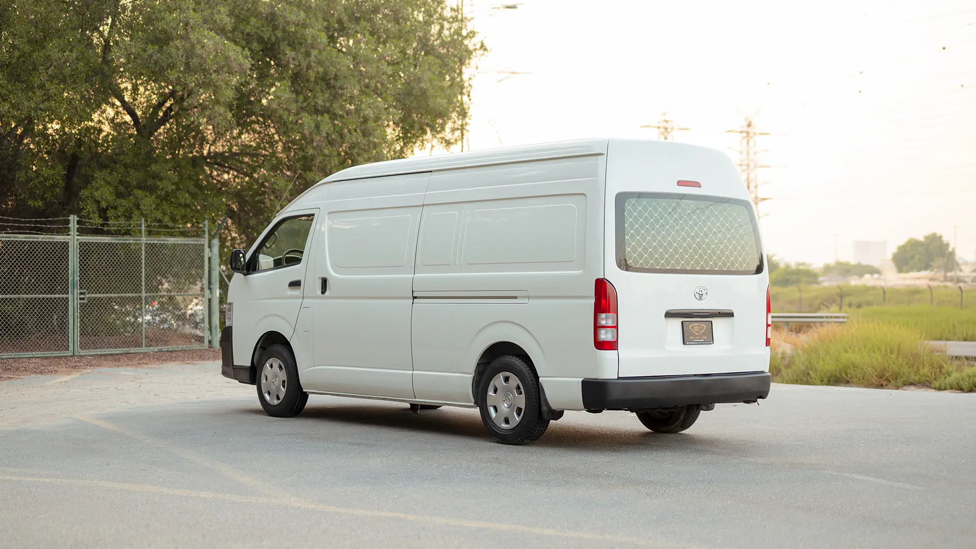 Used 2012 Toyota Hiace GL High Roof in White – Right Back Diagonal (45°) View for Sale at First Choice Cars Dubai Sharjah