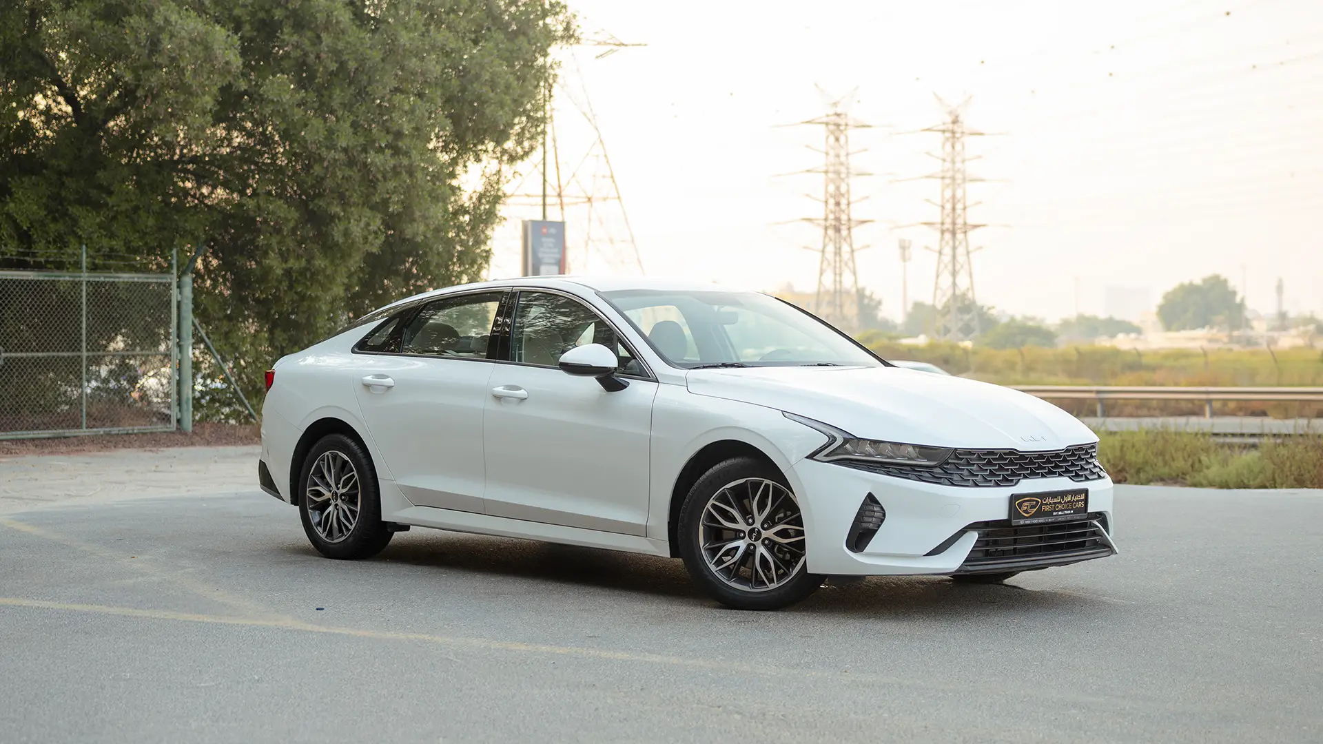 Used 2023 Kia K5 EX in White – Right Front Diagonal (45°) View for Sale at First Choice Cars Dubai Sharjah