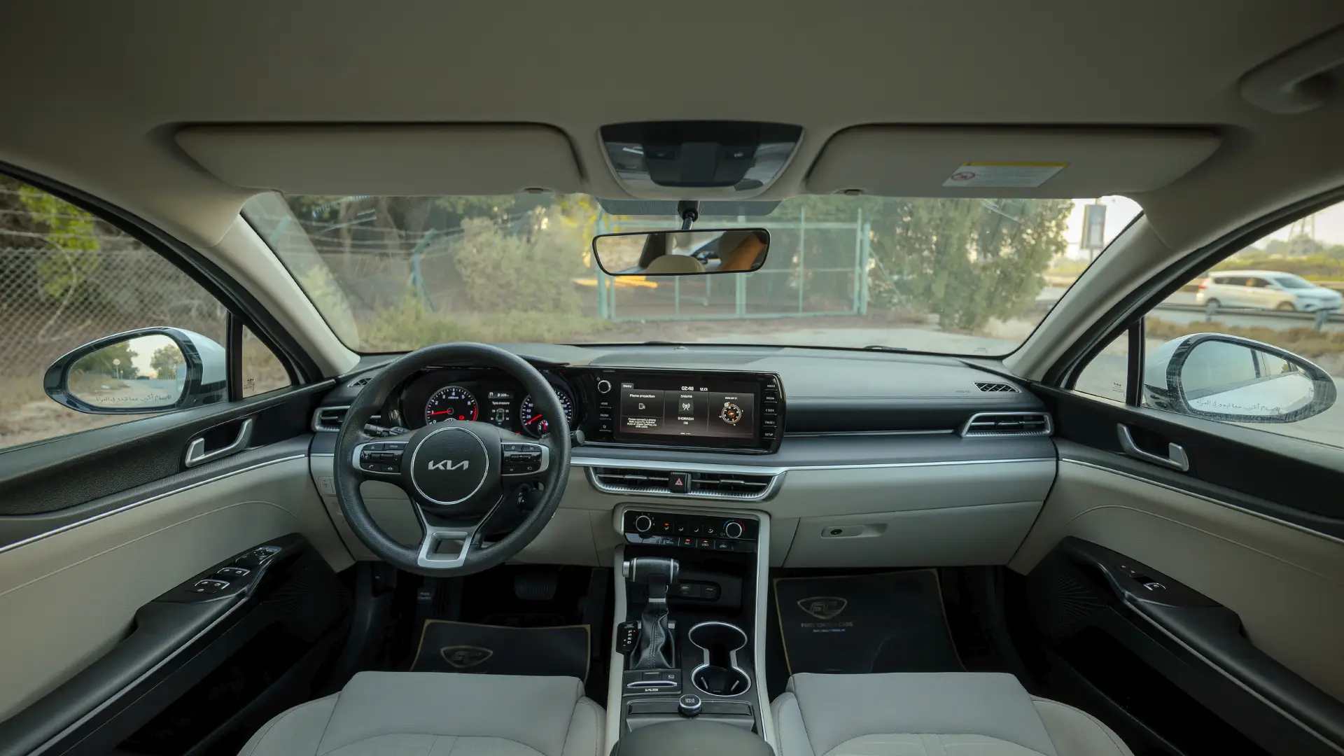 Used 2023 Kia K5 EX in White – Front Cabin / Dashboard Full View for Sale at First Choice Cars Dubai Sharjah
