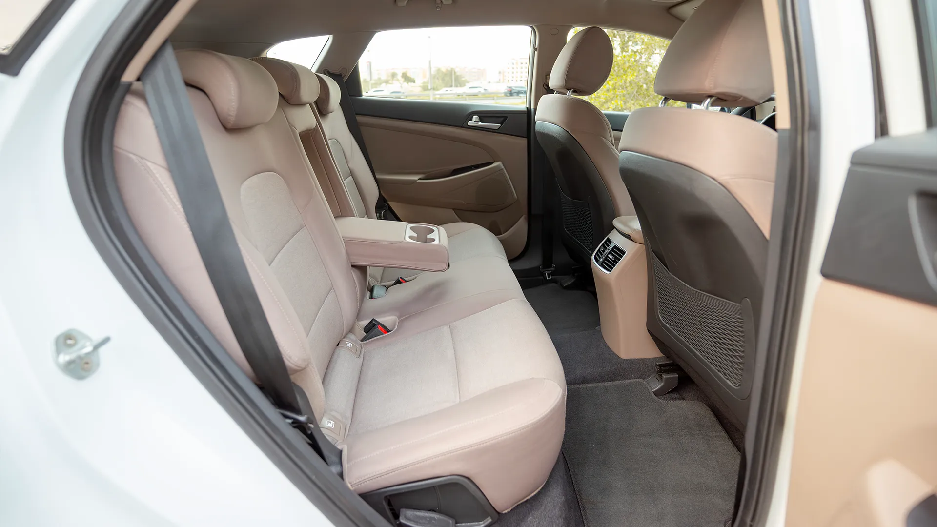 Used 2020 Hyundai Tucson GLS in White – Rear Passenger Side Cabin View for Sale at First Choice Cars Dubai Sharjah