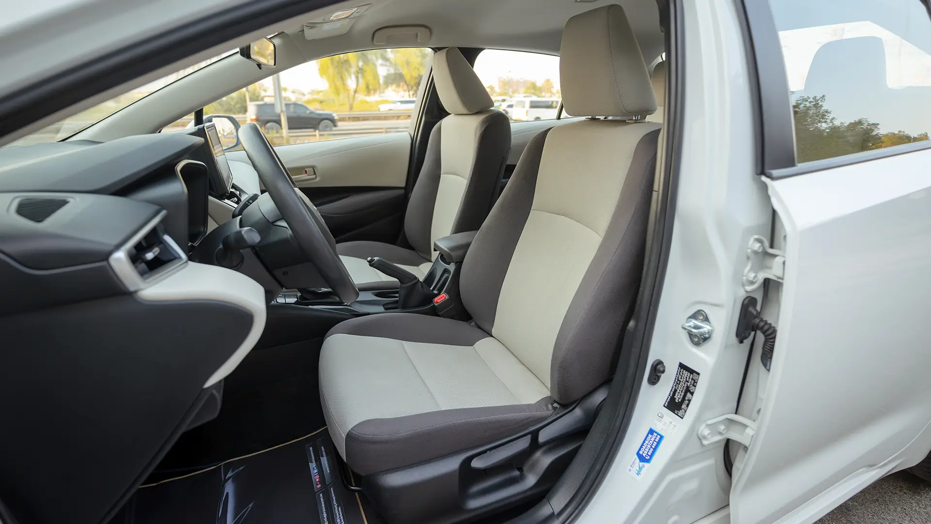 Used 2024 Toyota Corolla XLI in White – Front Driver Side Cabin View for Sale at First Choice Cars Dubai Sharjah