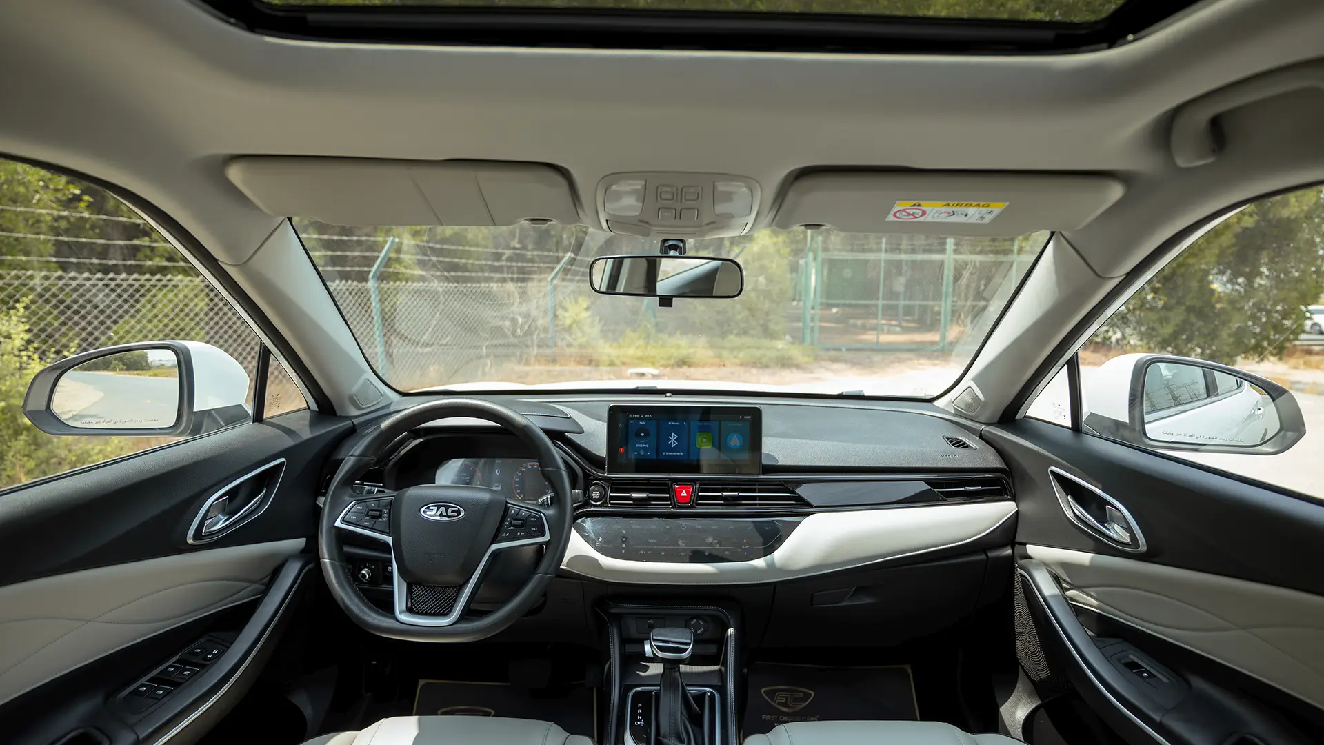 Used 2023 JAC JS4 Intelligent in White – Front Cabin / Dashboard Full View for Sale at First Choice Cars Dubai Sharjah