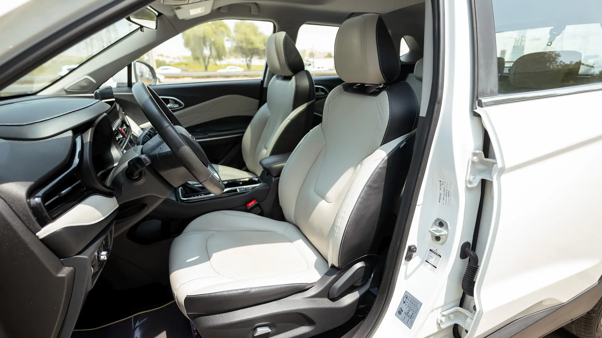 Used 2023 JAC JS4 Intelligent in White – Front Driver Side Cabin View for Sale at First Choice Cars Dubai Sharjah