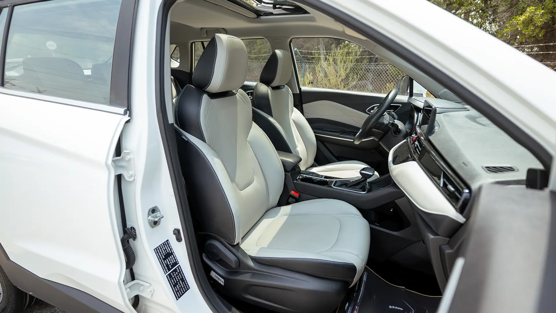 Used 2023 JAC JS4 Intelligent in White – Front Passenger Side Cabin View for Sale at First Choice Cars Dubai Sharjah