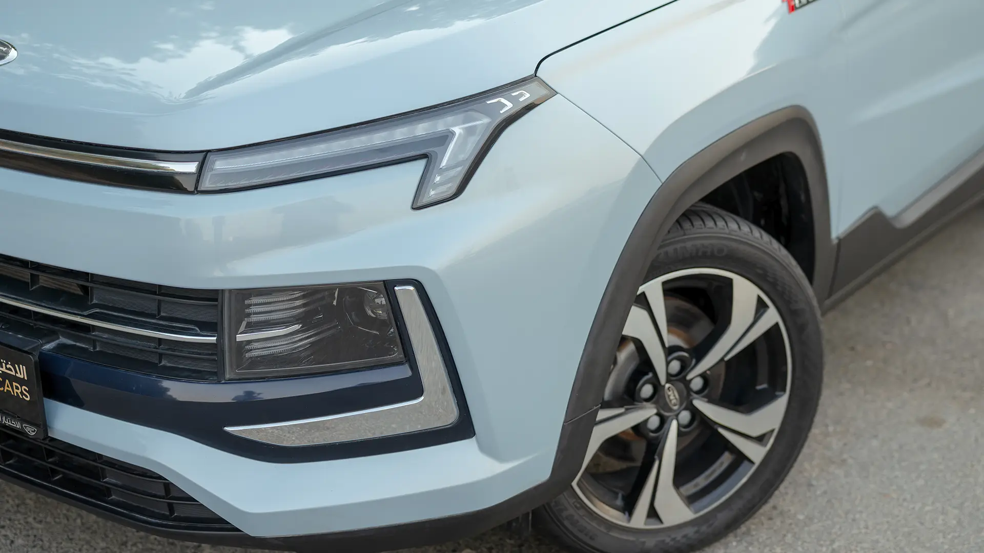 Used 2023 JAC JS4 Intelligent in Blue – Headlight Close-up for Sale at First Choice Cars Dubai Sharjah