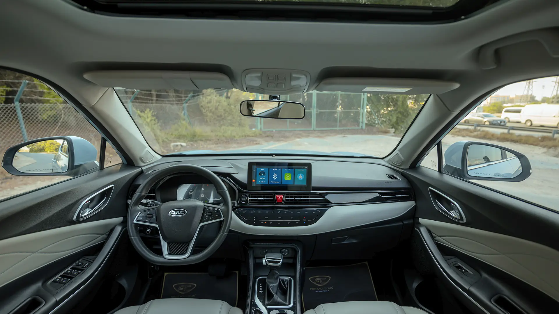 Used 2023 JAC JS4 Intelligent in Blue – Front Cabin / Dashboard Full View for Sale at First Choice Cars Dubai Sharjah