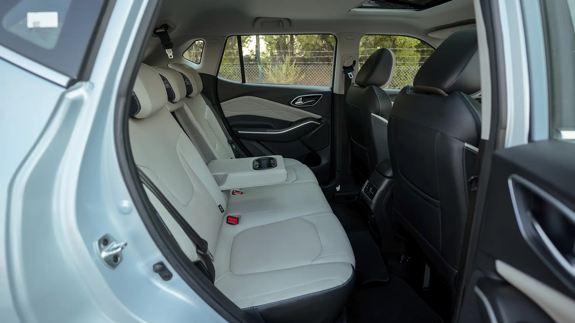 Used 2023 JAC JS4 Intelligent in Blue – Rear Passenger Side Cabin View for Sale at First Choice Cars Dubai Sharjah