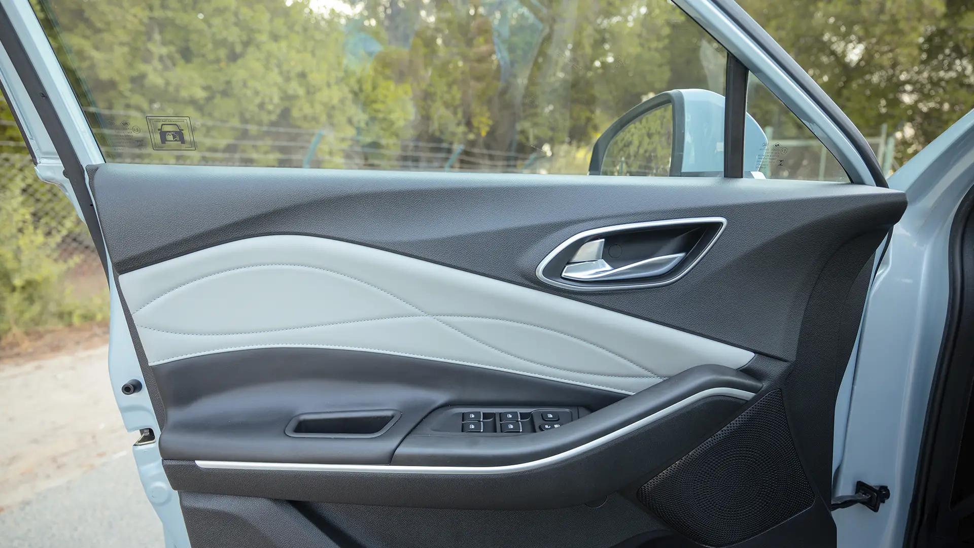 Used 2023 JAC JS4 Intelligent in Blue – Driver Door Panel Full View for Sale at First Choice Cars Dubai Sharjah