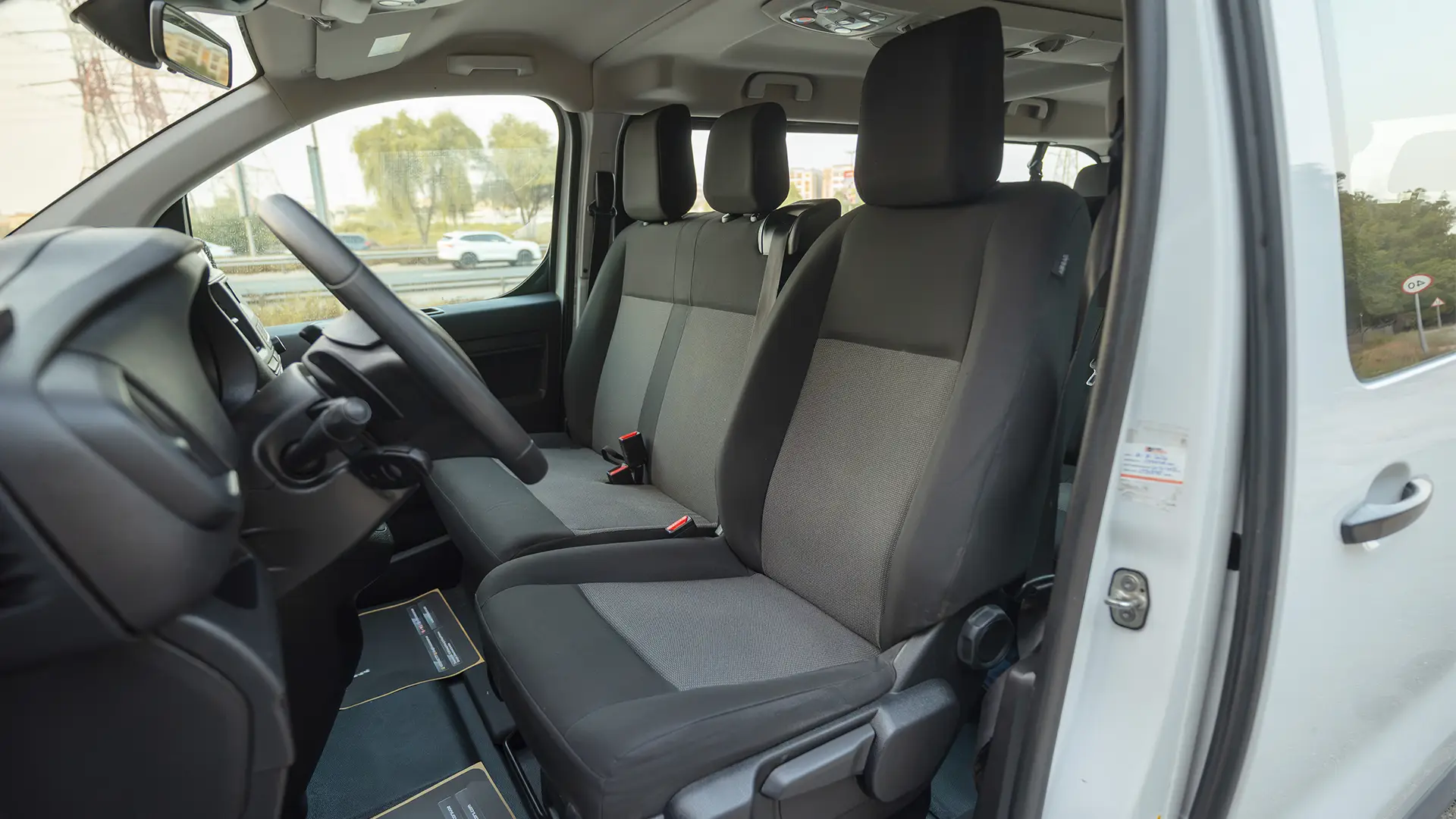 Used 2024 Peugeot Traveller L3 Vip in White – Front Driver Side Cabin View for Sale at First Choice Cars Dubai Sharjah