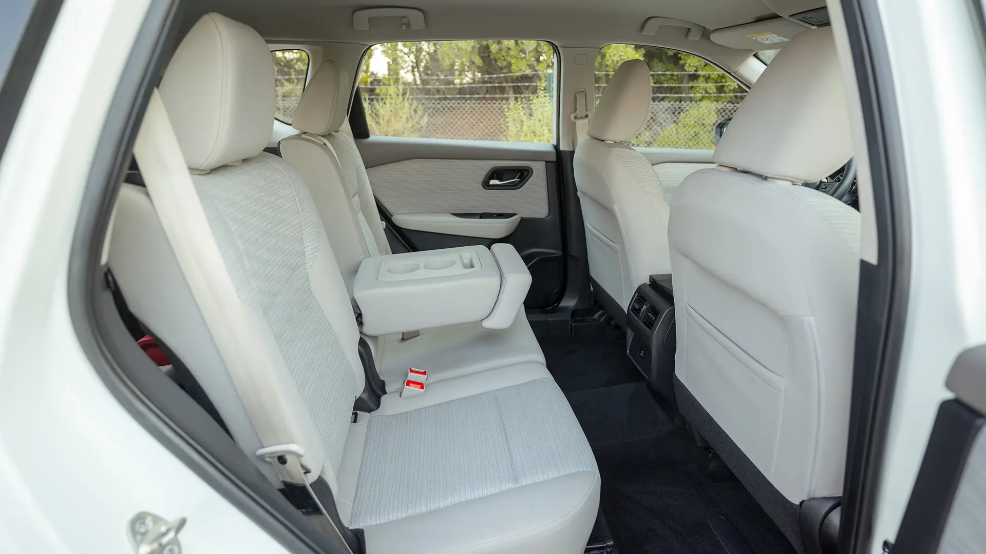 Used 2024 Nissan X-Trail S in White – Rear Passenger Side Cabin View for Sale at First Choice Cars Dubai Sharjah