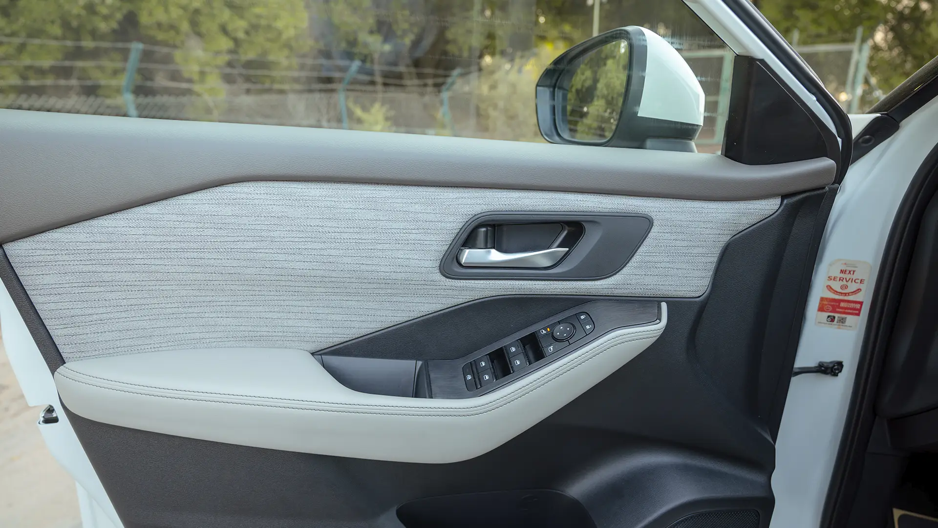 Used 2024 Nissan X-Trail S in White – Driver Door Panel Full View for Sale at First Choice Cars Dubai Sharjah